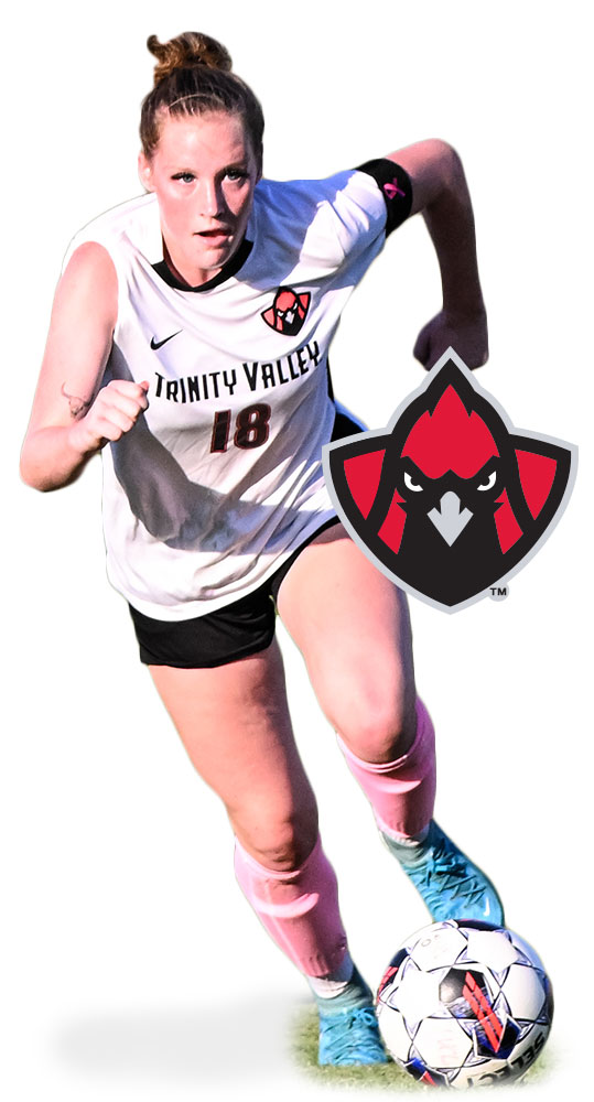 woman soccer player running on the field with a soccerball